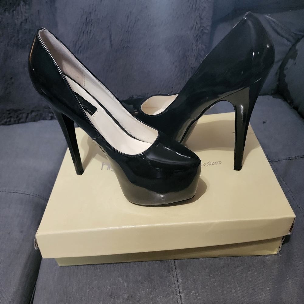 The highest heel patent leather black pumps